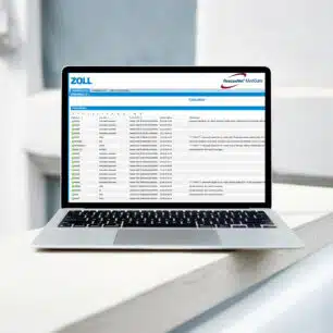 RescueNet MedGate software med patientliste vises på bærbar computer placeret på hvid skranke.